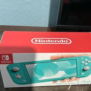 Nintendo Switch Lite Turquoise Handheld Gaming Console - Boxed Display